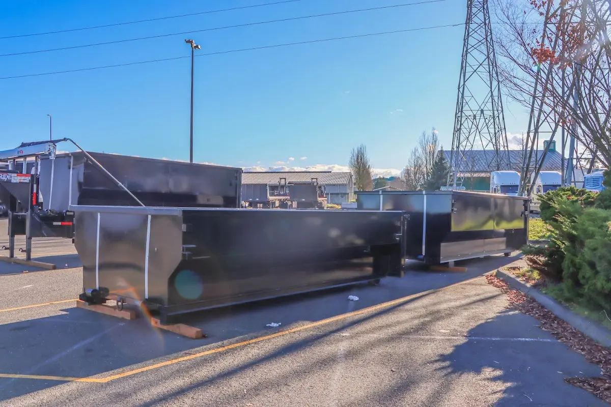Roll-off dumpster ready for waste disposal at job site for Yard Waste Dumpster Rental in Portsmouth